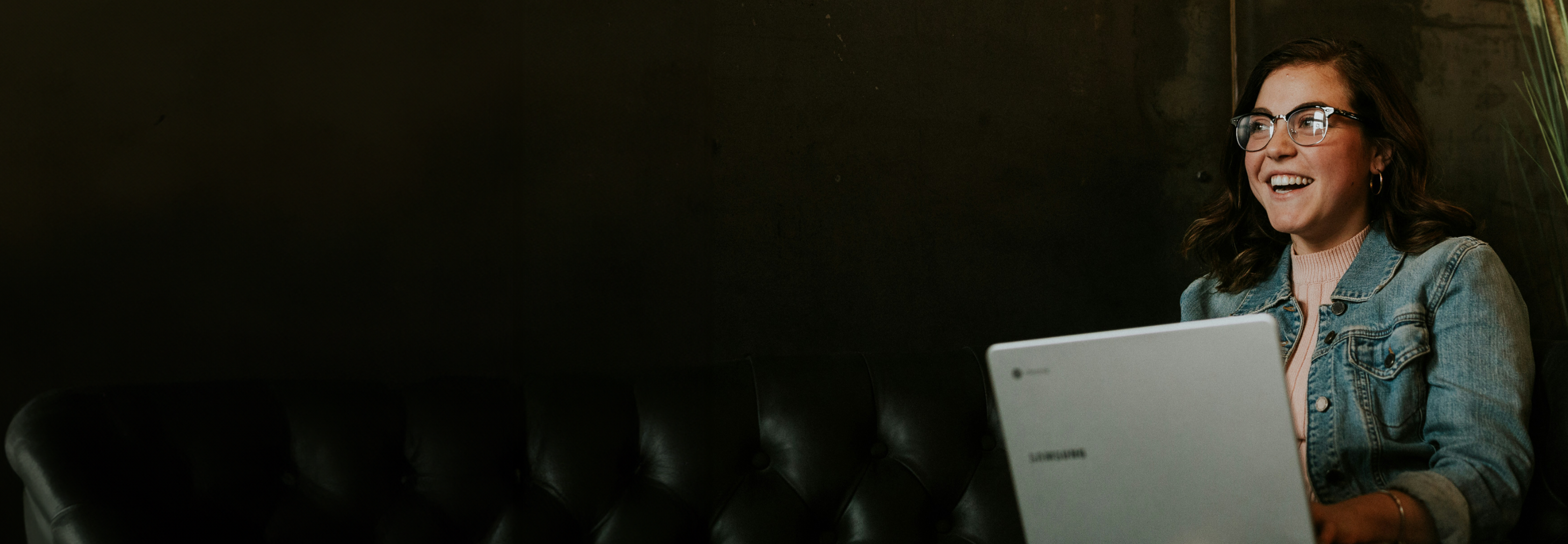 Professional woman using laptop